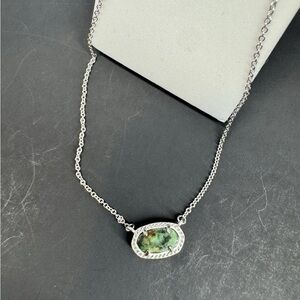 Kendra Scott Silver Necklace
Green Oval Pendant Cable
Chain Lobster Clasp